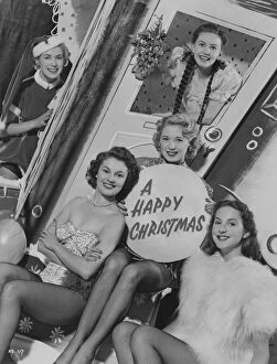 Christmas Collection: Happy Christmas greetings portrait taken at Elstree Studios in 1952