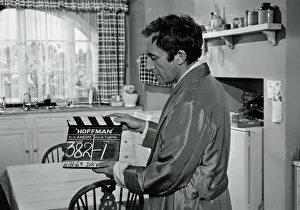 <b class=qtipBold><figcaption>Hoffman (1970)</figcaption></b><br>Peter Sellers holds a clapperboard during the filming of Alvin Rakoff's Hoffman (1970).<br><em>© Copyright Studiocanal Films Ltd</em> Hoffman (1970)