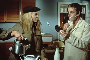 <b class=qtipBold><figcaption>Hoffman (1970)</figcaption></b><br>Peter Sellers as Benjamin Hoffman and Sinead Cusack as Janet Smith in a kitchen scene from 'Hoffman'.<br><em>© Copyright Studiocanal Films Ltd</em> Hoffman (1970)
