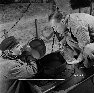 Hugh Griffith as Dan and Stanley Holloway as Mr Valentine
