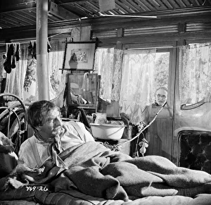 Hugh Griffith and Edie Martin