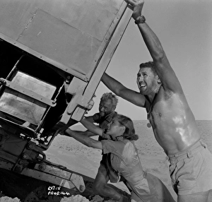 <b class=qtipBold><figcaption>Ice Cold In Alex</figcaption></b><br><br><em>© Copyright © Studiocanal Films Ltd</em> Ice Cold In Alex