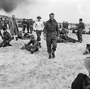 John Mills with Sean Barrett and Bernard Lee in the background John Mills with Sean Barrett and Bernard Lee in the background