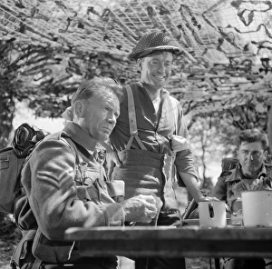 A medium close up of John Mills