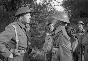A medium close up of John Mills