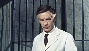 Michael Gough as Dr. Decker