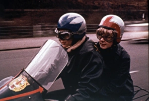 <b class=qtipBold><figcaption>Some People</figcaption></b><br>Angela Douglas on a motorbike in a scene from Some People<br><em>© Copyright Studiocanal Films Ltd</em> Some People