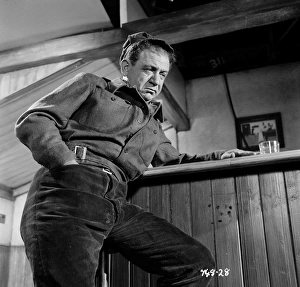 A portrait of Sid James