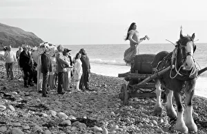 The procession reaches the beach for the finale