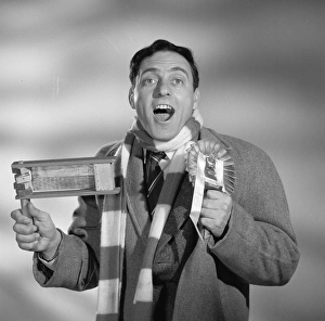 A publicity portrait from Rattle of a Simple Man (1964) taken on set at Elstree Studios