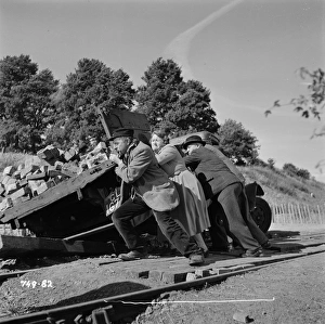 Pushing the truck off the tracks