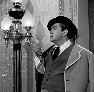 <b class=qtipBold><figcaption>The Rebel (1961)</figcaption></b><br>Tony Hancock in a sophisticated pose in his role for Robert Day's 'The Rebel' released in 1961.<br><em>© Copyright Studiocanal Films Ltd</em> The Rebel (1961)