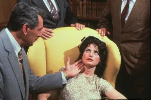 Mystery Prints: Rock Hudson and Maureen Bennett in a scene from The Mirror Crack d (1980)