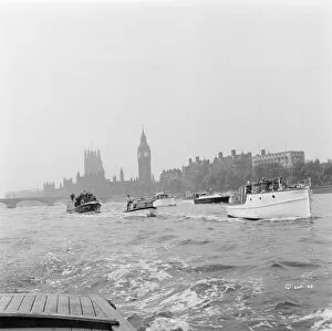 Boat Collection: Small boats on the Thames with The Houses of Parliament in the background