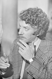 Waist Up Prints: A smiling Donald Sutherland on the set of Don t Look Now