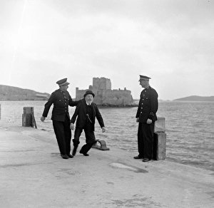 <b class=qtipBold><figcaption>Whisky Galore</figcaption></b><br>whi_bw_neg_ 11<br><em>© Copyright © Studiocanal Films Ltd</em> Whisky Galore