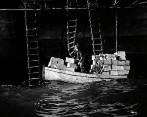 <b class=qtipBold><figcaption>Whisky Galore</figcaption></b><br><br><em>© Copyright © Studiocanal Films Ltd</em> Whisky Galore