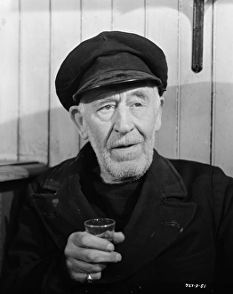 <b class=qtipBold><figcaption>Whisky Galore</figcaption></b><br>whi_bw_neg_por_ 04<br><em>© Copyright © Studiocanal Films Ltd</em> Whisky Galore